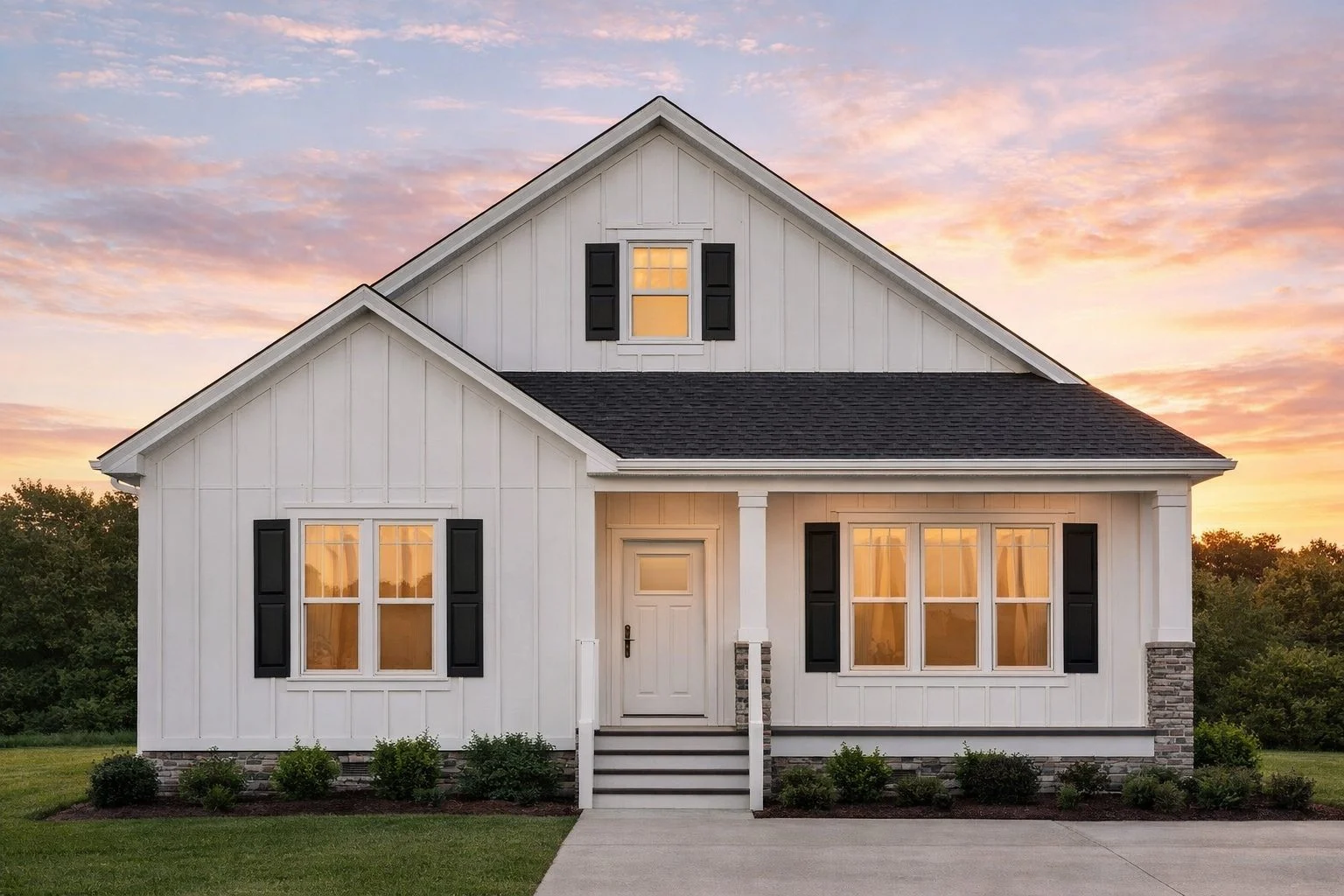 Front view of a Modern Farmhouse Cottage home featuring board and batten siding, brick accents, and a simple gabled roofline