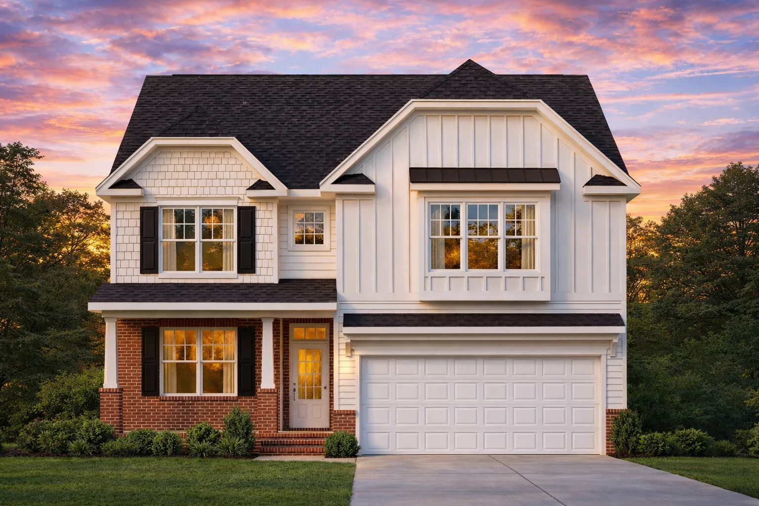 Front view of a Modern Farmhouse style home featuring board and batten siding, stone accents, and traditional Craftsman detailing with a gabled roofline.