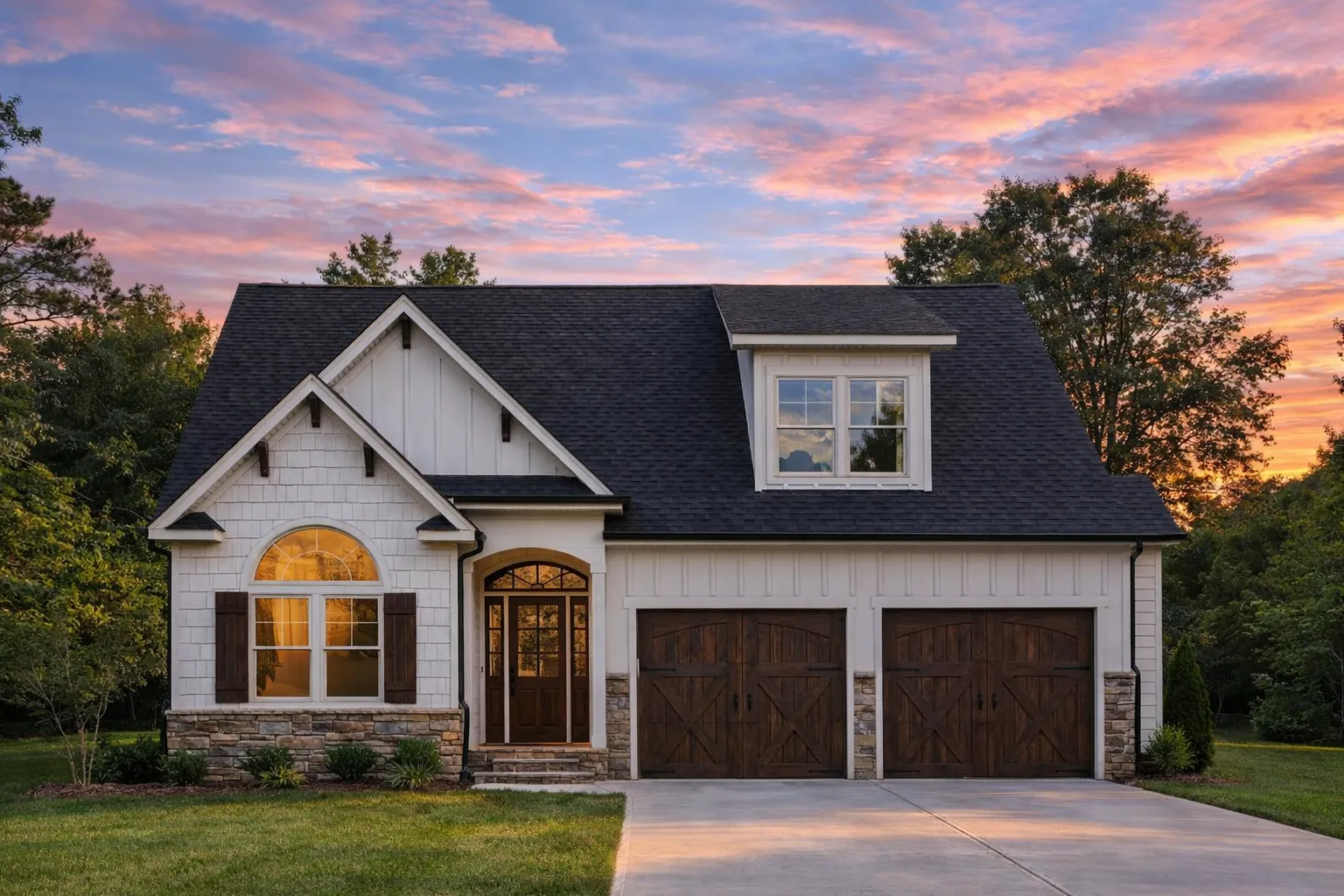 House Plans with Master on Main 5 Front exterior view of a Traditional Suburban Craftsman style home featuring stone accents, shake siding, and a symmetrical gable roof