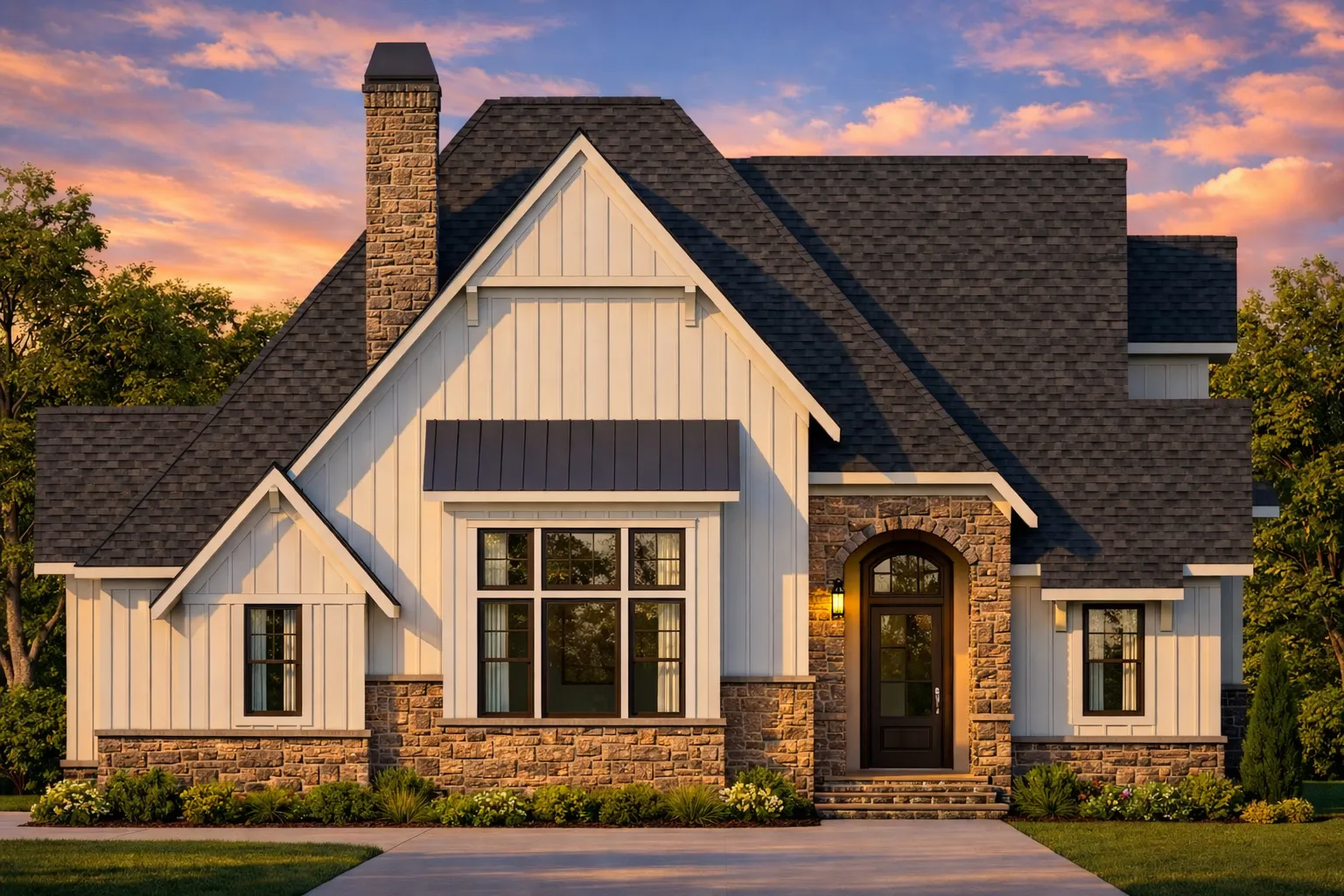 Front elevation of Modern Farmhouse style home with white board and batten siding, stone veneer base, gabled roof, and covered entry