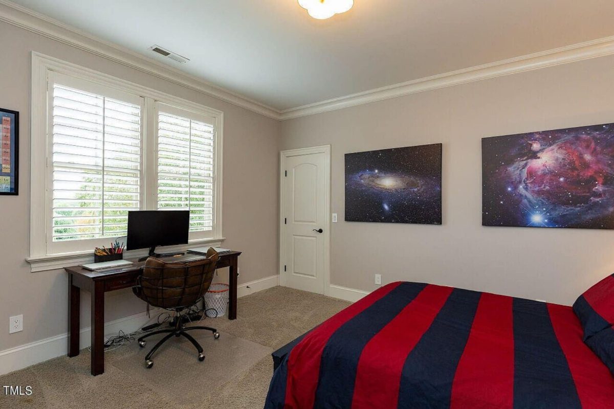 Traditional 4-Bedroom House Plan with Front-Entry Garage