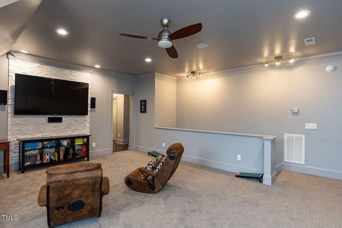 Traditional 4-Bedroom House Plan with Front-Entry Garage