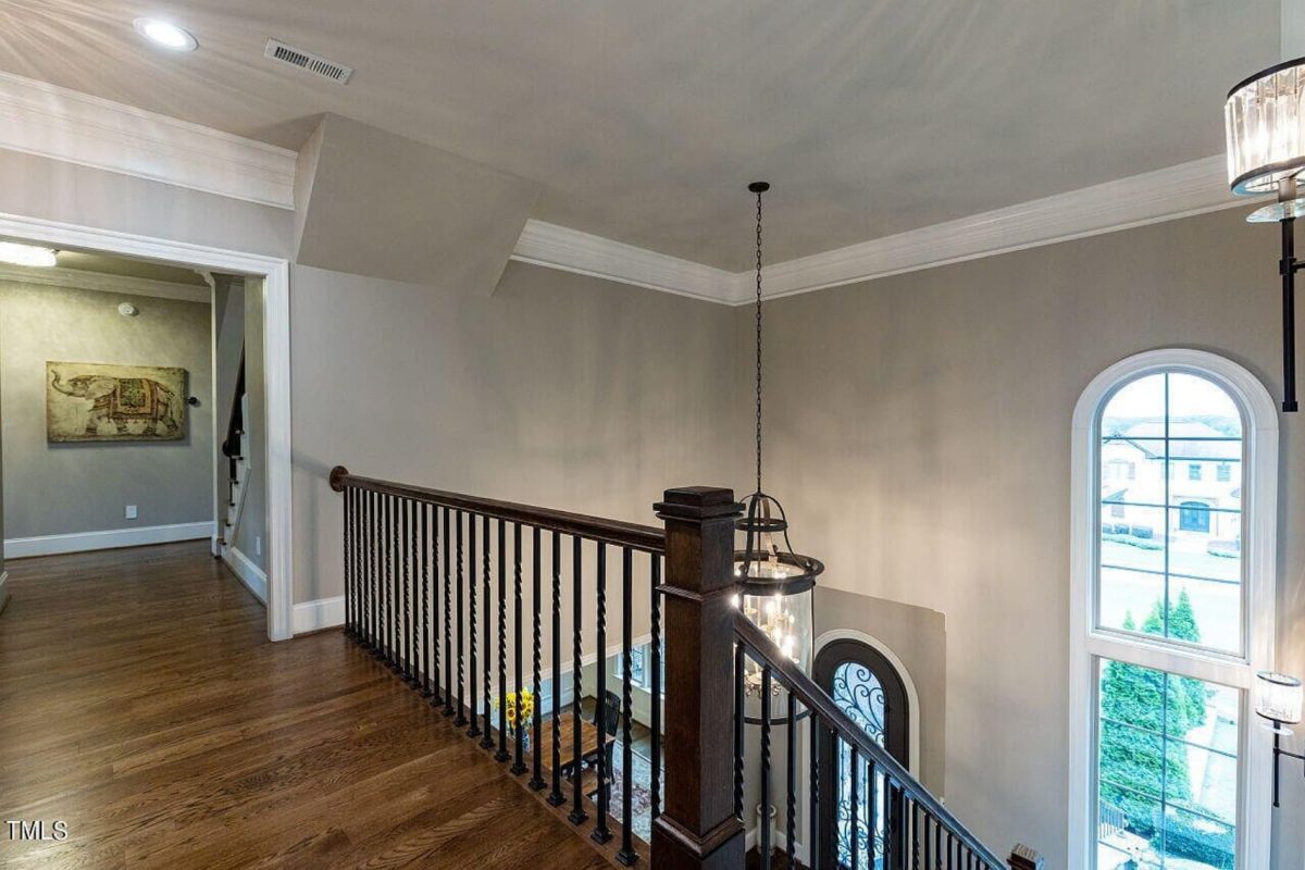 Traditional 4-Bedroom House Plan with Front-Entry Garage