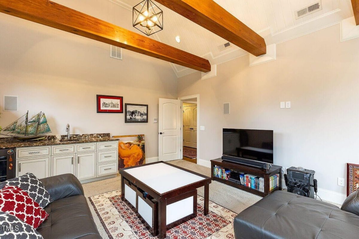 Traditional 4-Bedroom House Plan with Front-Entry Garage