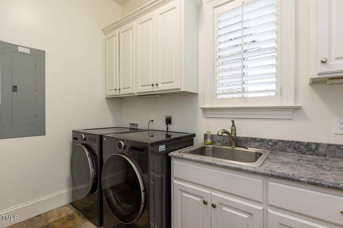 Traditional 4-Bedroom House Plan with Front-Entry Garage