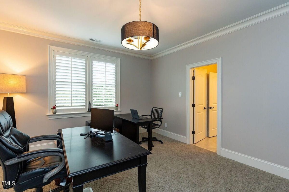 Traditional 4-Bedroom House Plan with Front-Entry Garage