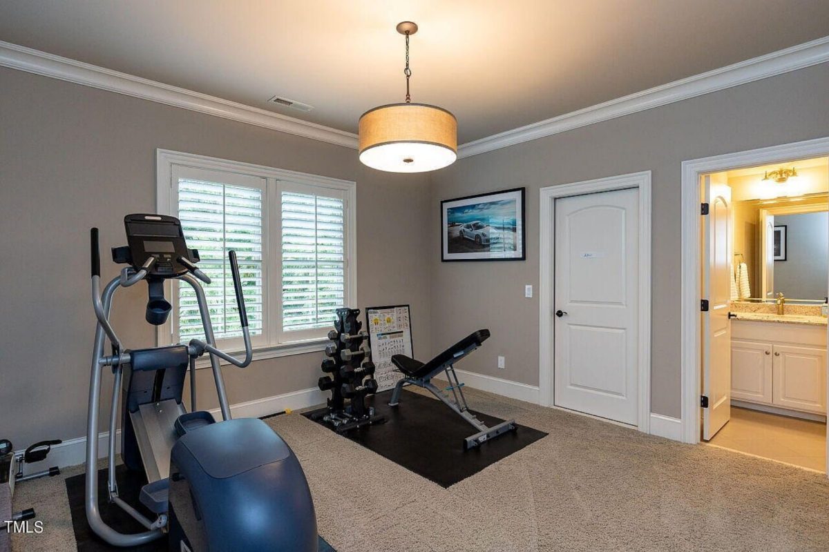 Traditional 4-Bedroom House Plan with Front-Entry Garage