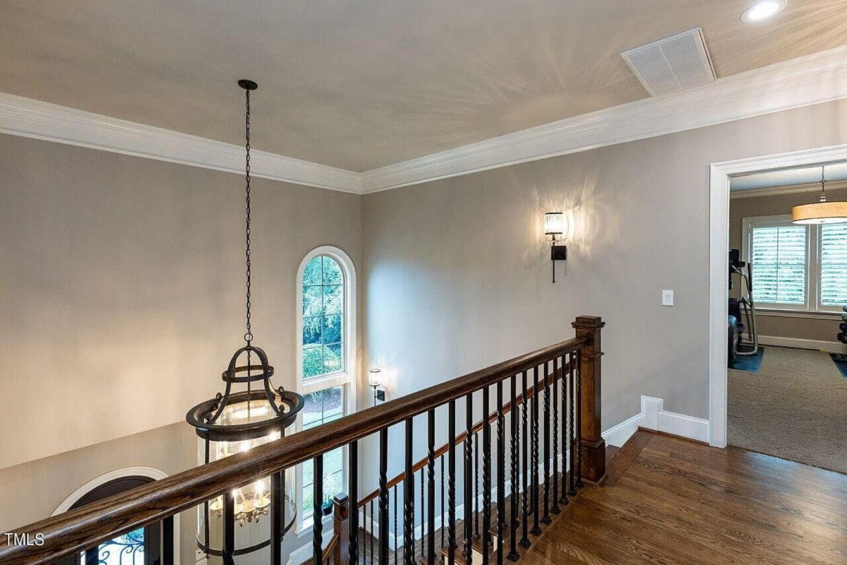 Traditional 4-Bedroom House Plan with Front-Entry Garage