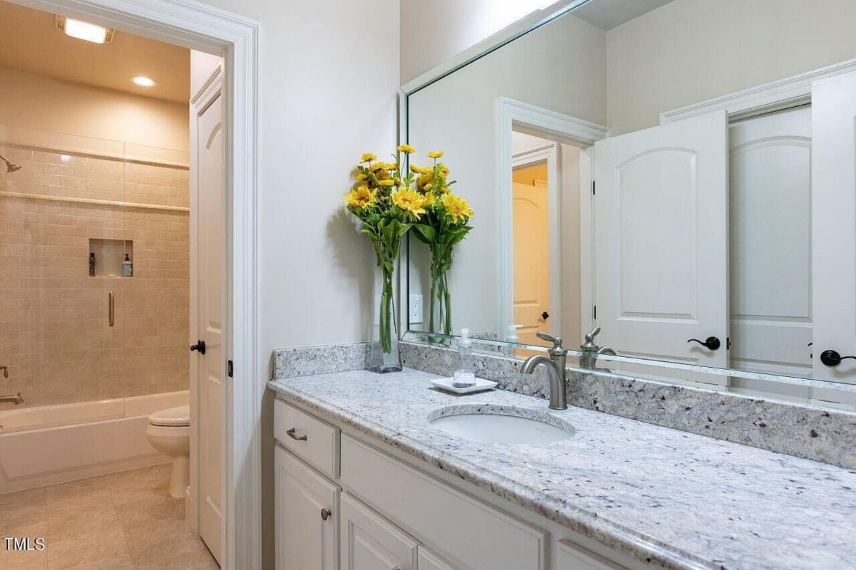 Traditional 4-Bedroom House Plan with Front-Entry Garage