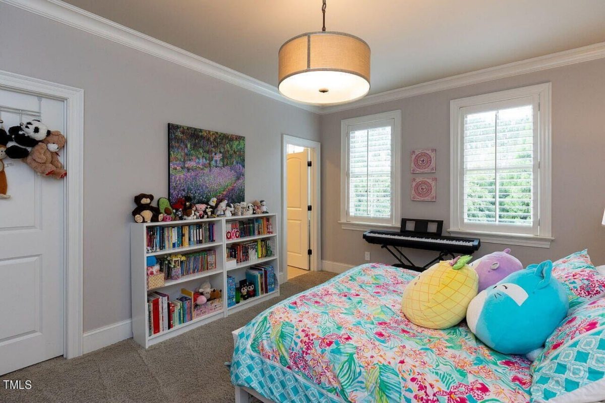 Traditional 4-Bedroom House Plan with Front-Entry Garage