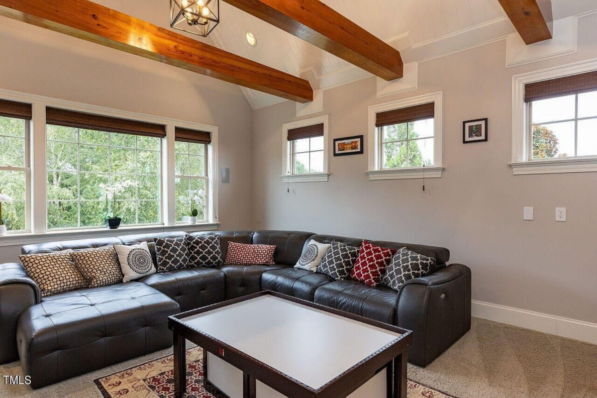 Traditional 4-Bedroom House Plan with Front-Entry Garage