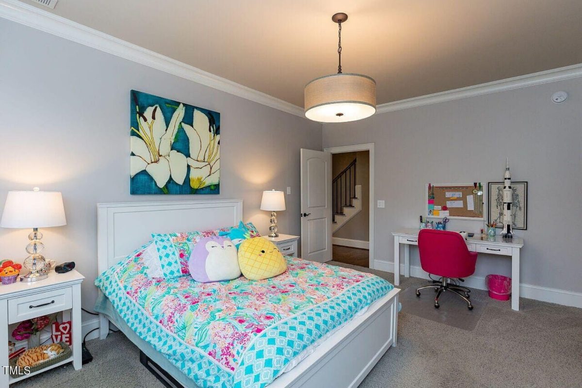 Traditional 4-Bedroom House Plan with Front-Entry Garage