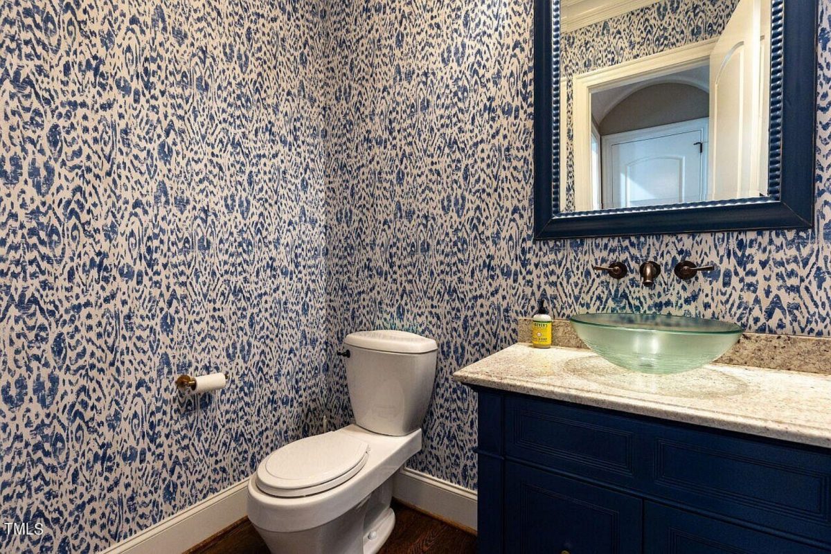 Traditional 4-Bedroom House Plan with Front-Entry Garage