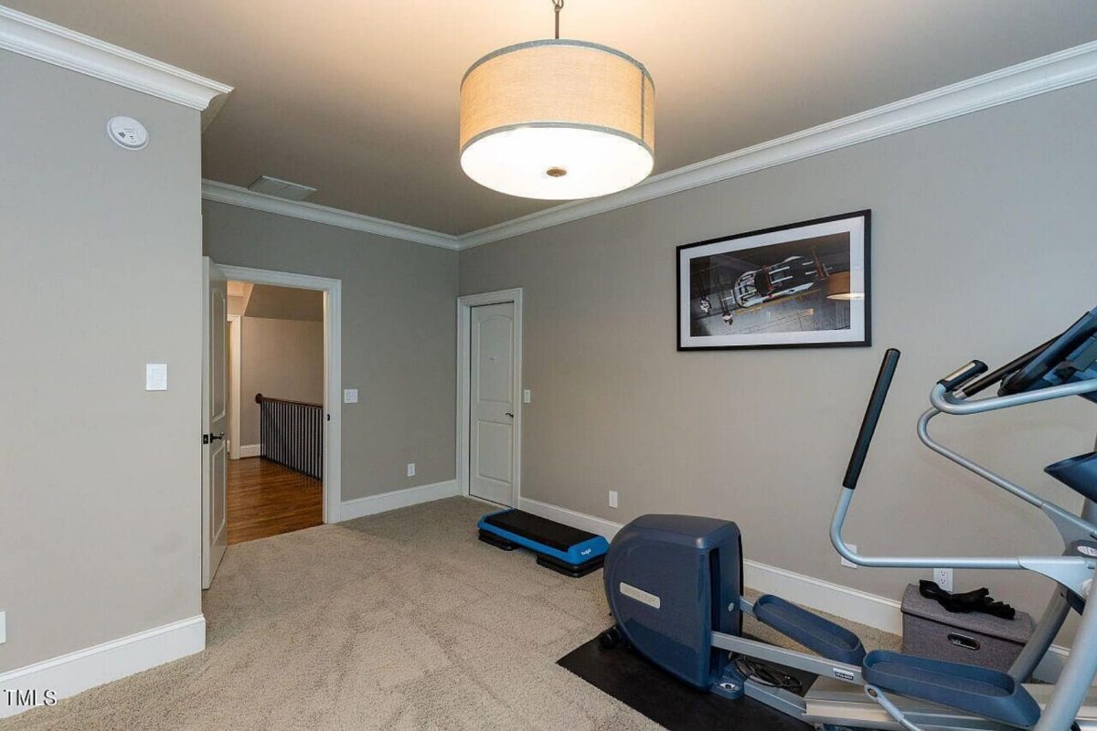 Traditional 4-Bedroom House Plan with Front-Entry Garage