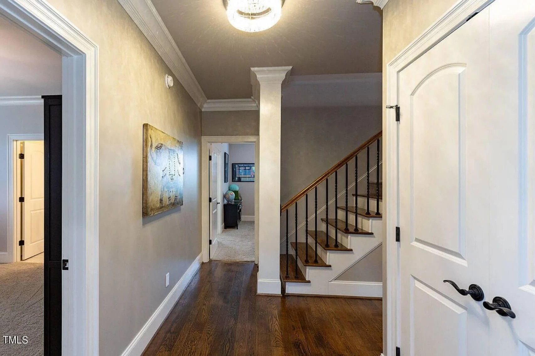 Traditional 4-Bedroom House Plan with Front-Entry Garage