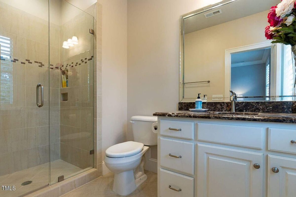 Traditional 4-Bedroom House Plan with Front-Entry Garage