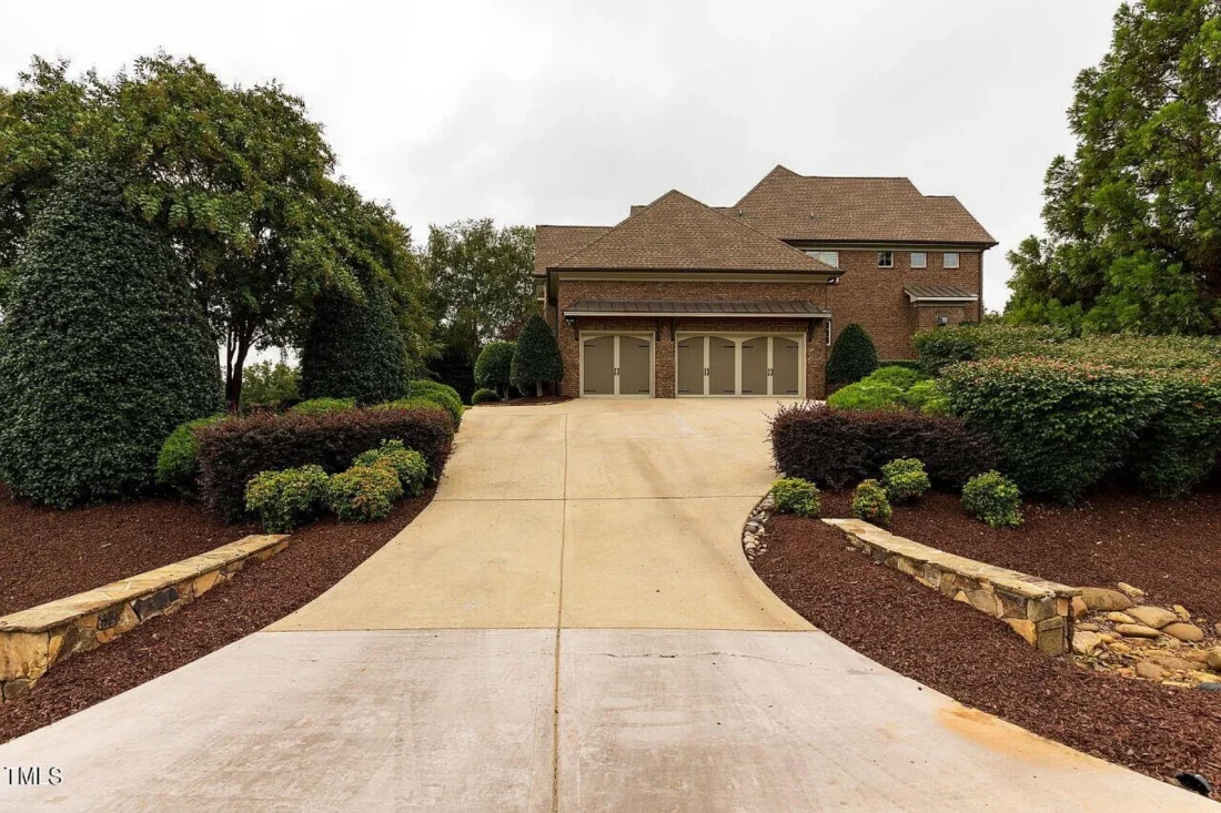 Traditional 4-Bedroom House Plan with Front-Entry Garage