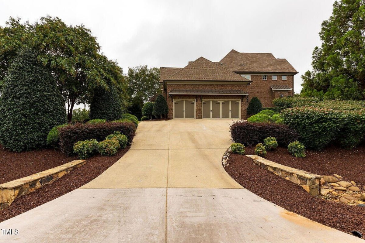 Traditional 4-Bedroom House Plan with Front-Entry Garage