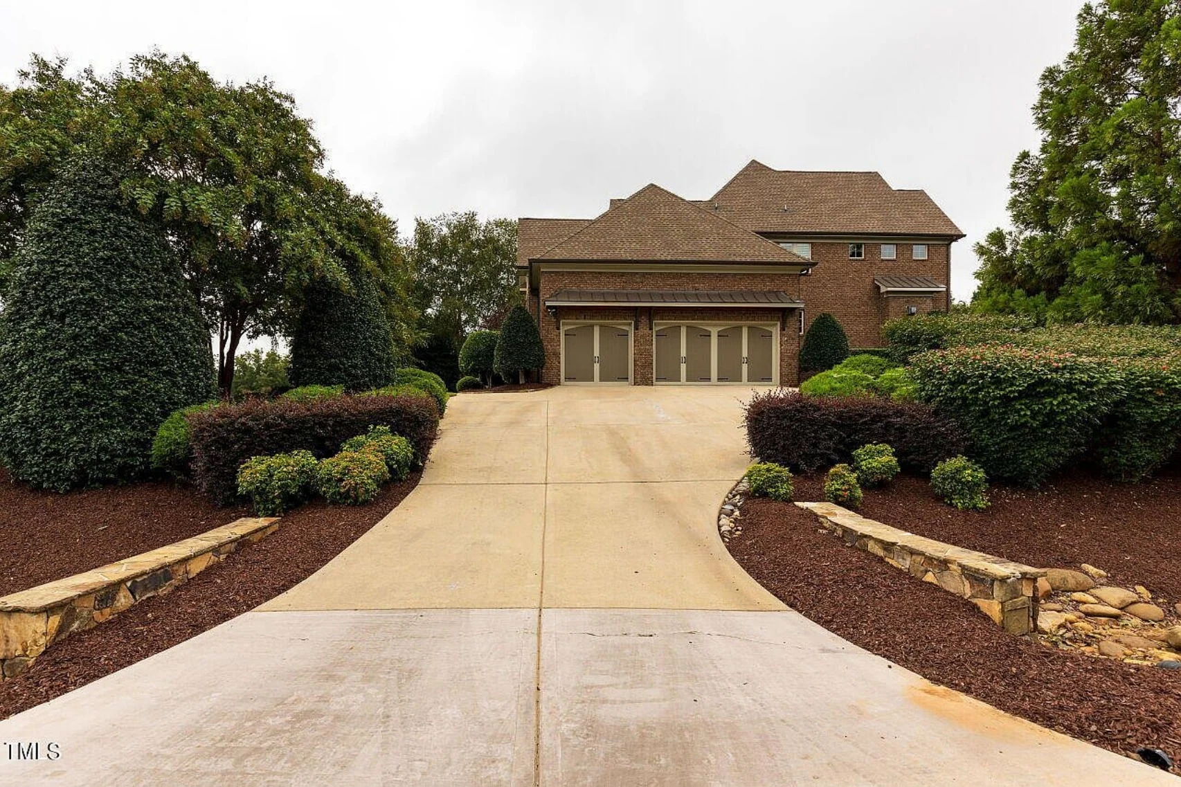 Traditional 4-Bedroom House Plan with Front-Entry Garage
