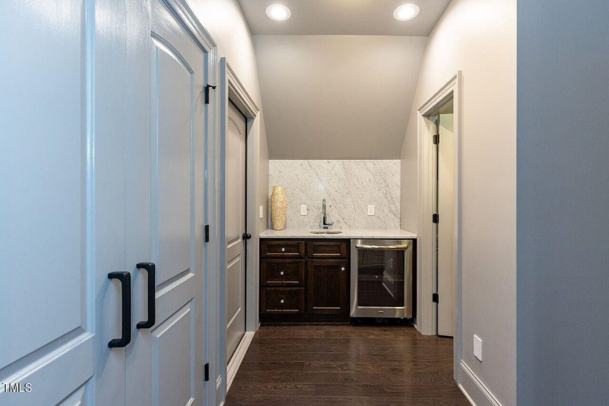 Traditional 4-Bedroom House Plan with Front-Entry Garage