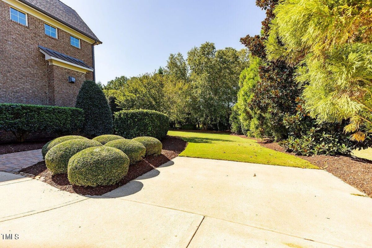 Traditional 4-Bedroom House Plan with Front-Entry Garage
