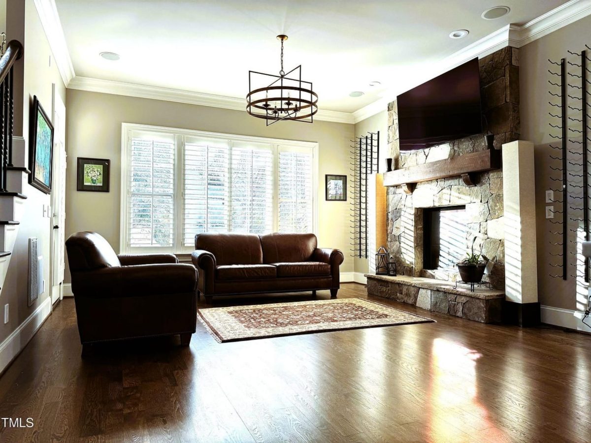 Traditional 4-Bedroom House Plan with Front-Entry Garage