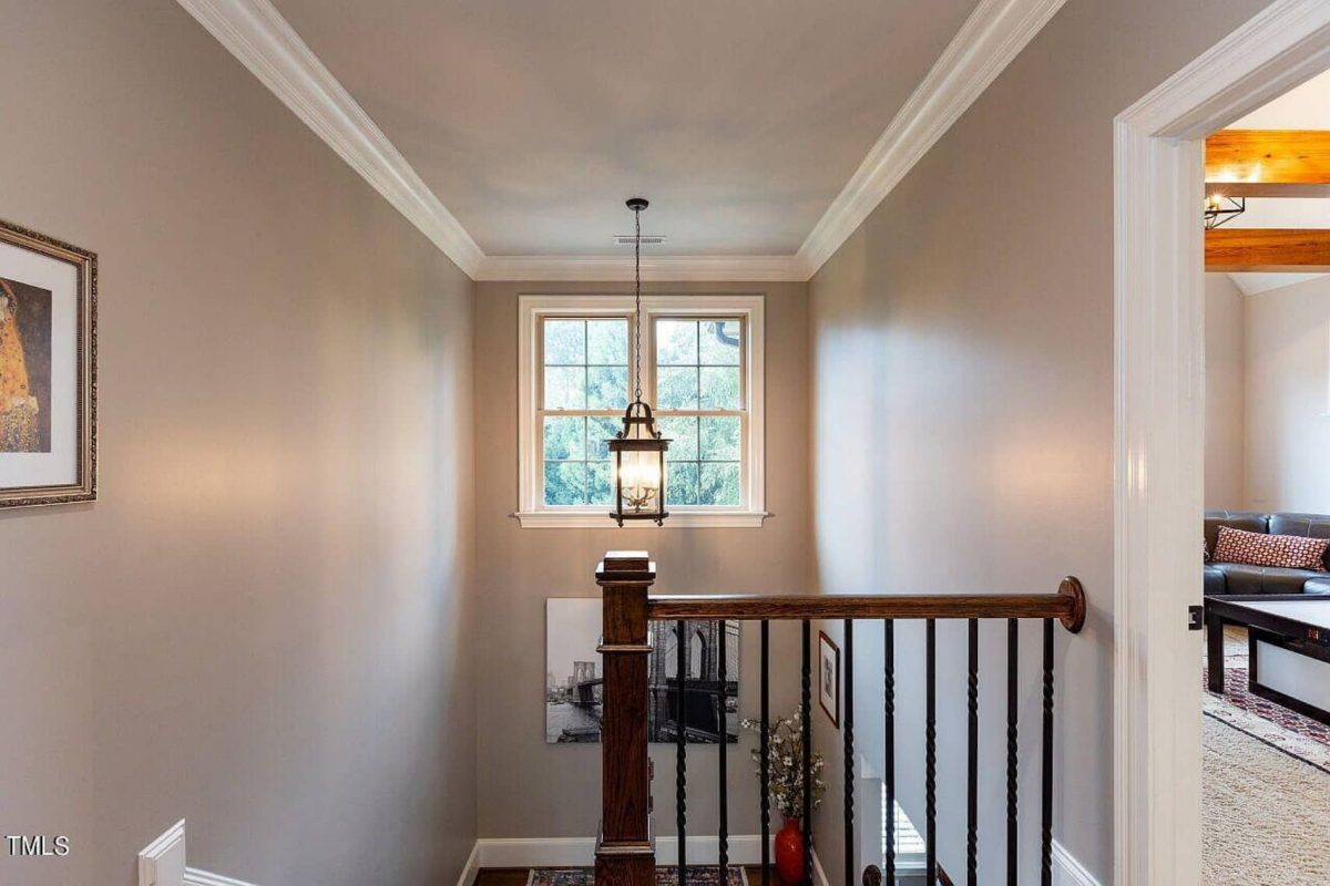 Traditional 4-Bedroom House Plan with Front-Entry Garage