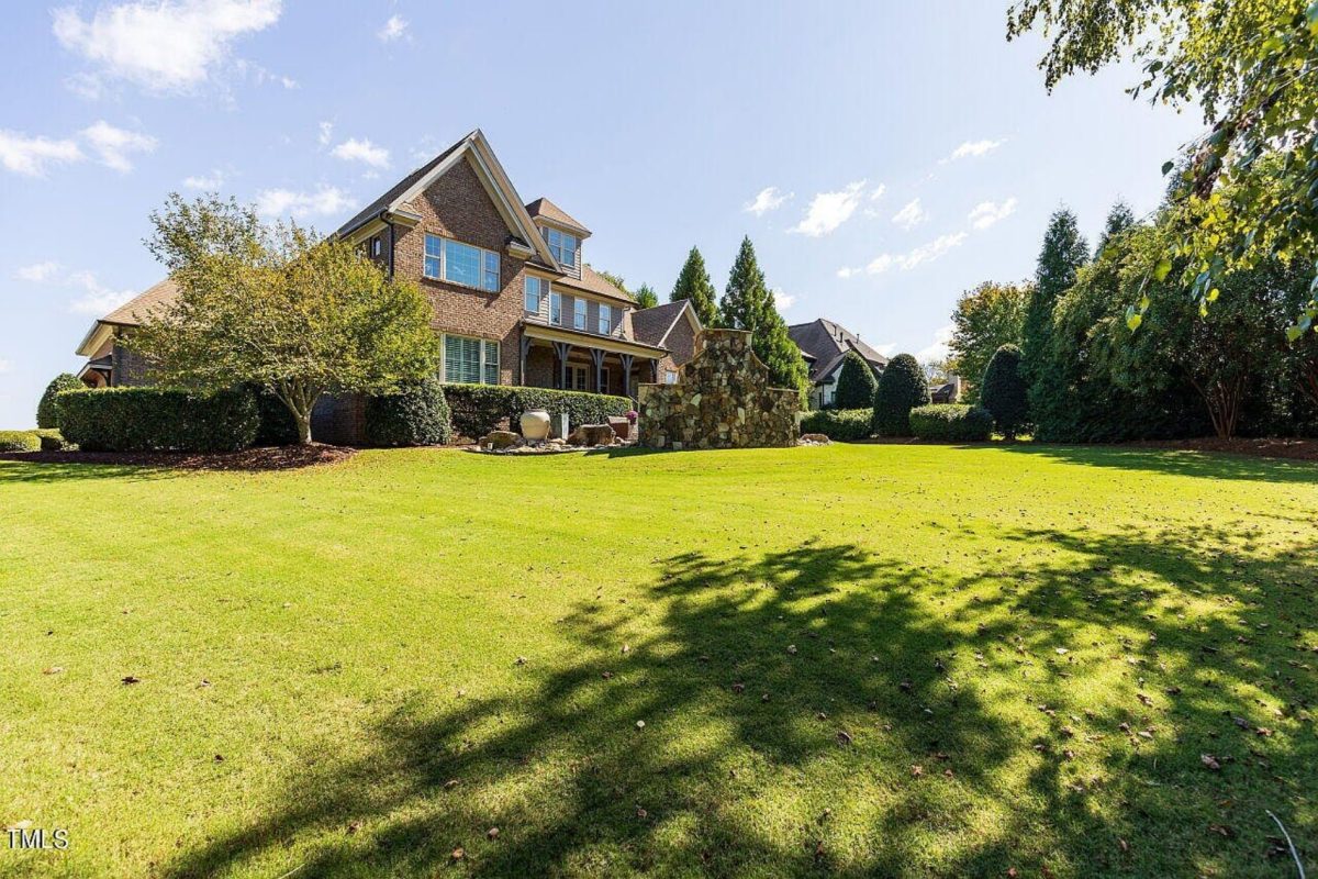 Traditional 4-Bedroom House Plan with Front-Entry Garage