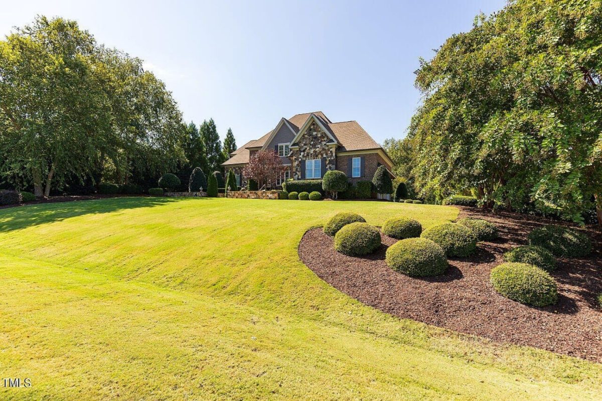 Traditional 4-Bedroom House Plan with Front-Entry Garage
