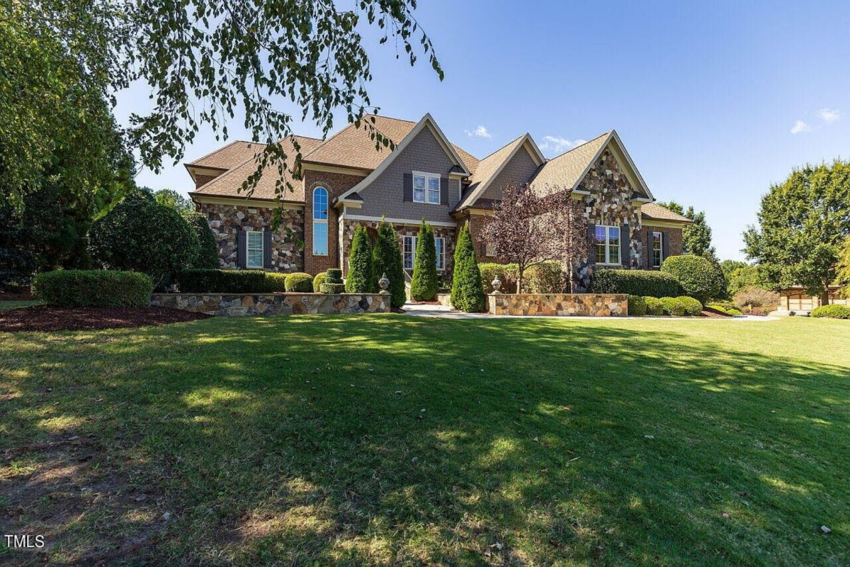 Traditional 4-Bedroom House Plan with Front-Entry Garage