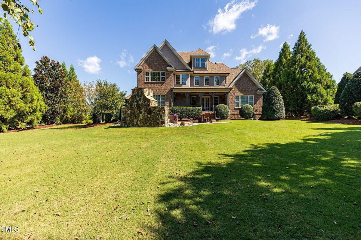 Traditional 4-Bedroom House Plan with Front-Entry Garage