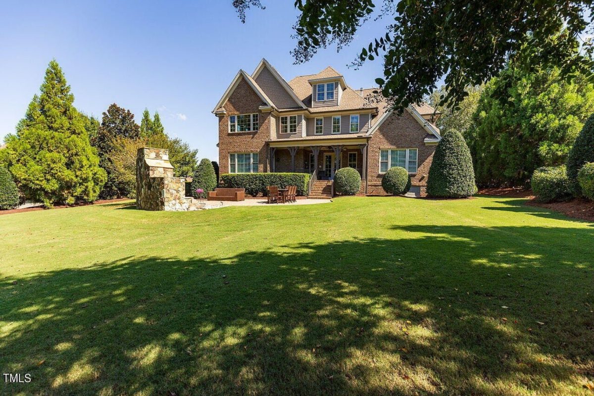 Traditional 4-Bedroom House Plan with Front-Entry Garage