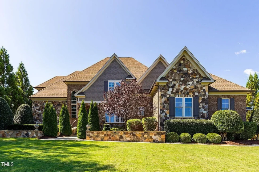 Traditional 4-Bedroom House Plan with Front-Entry Garage