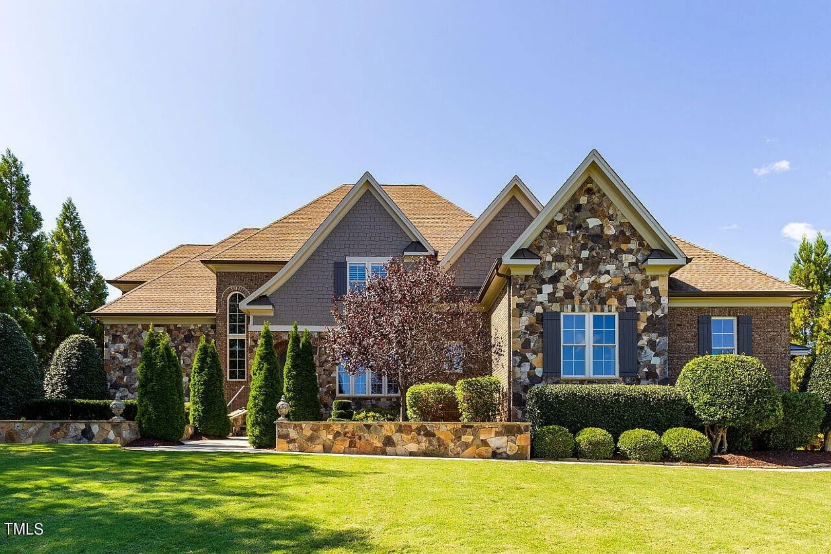 Traditional 4-Bedroom House Plan with Front-Entry Garage