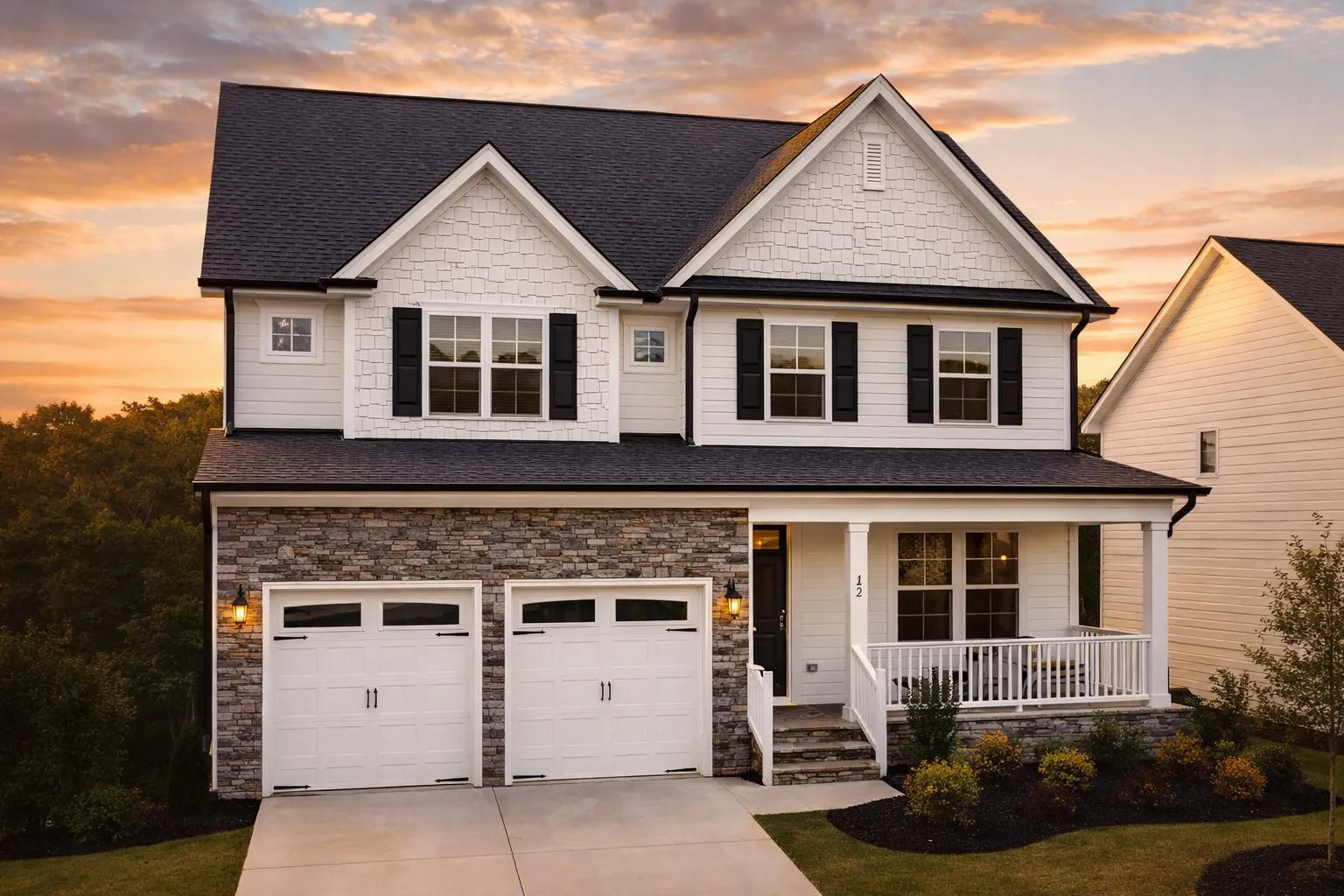 Front elevation of a New American Modern Traditional house with Craftsman accents, horizontal siding, board and batten details, and a covered front porch