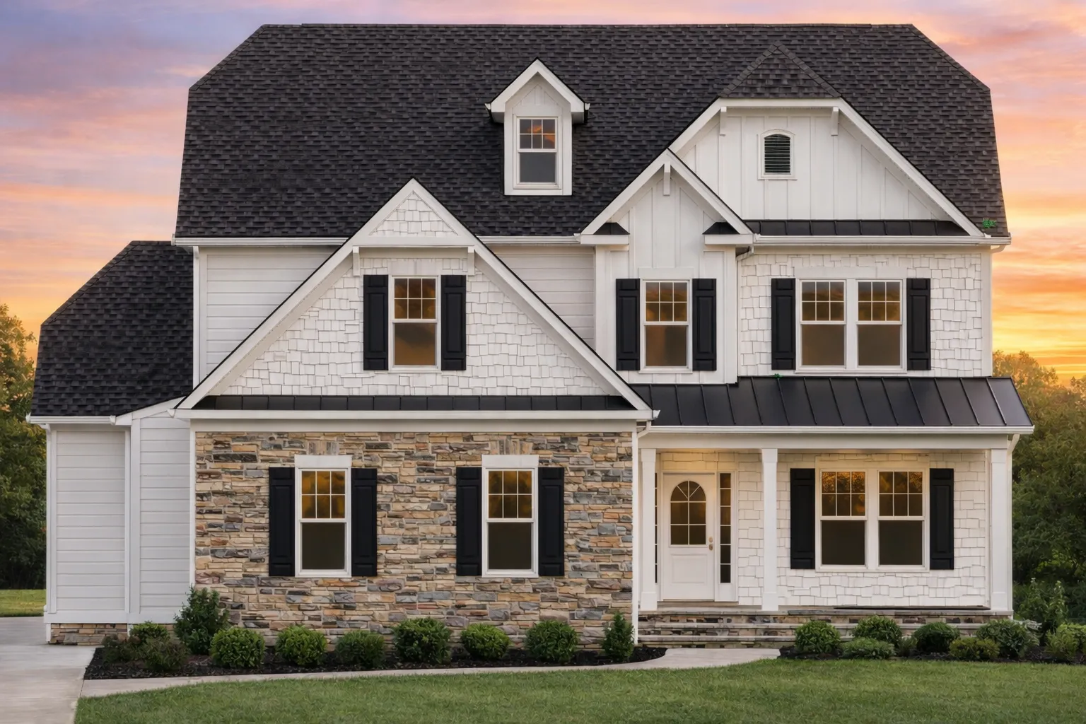 Front elevation of a Modern Farmhouse New American style home with board and batten siding, stone foundation, and covered front porch