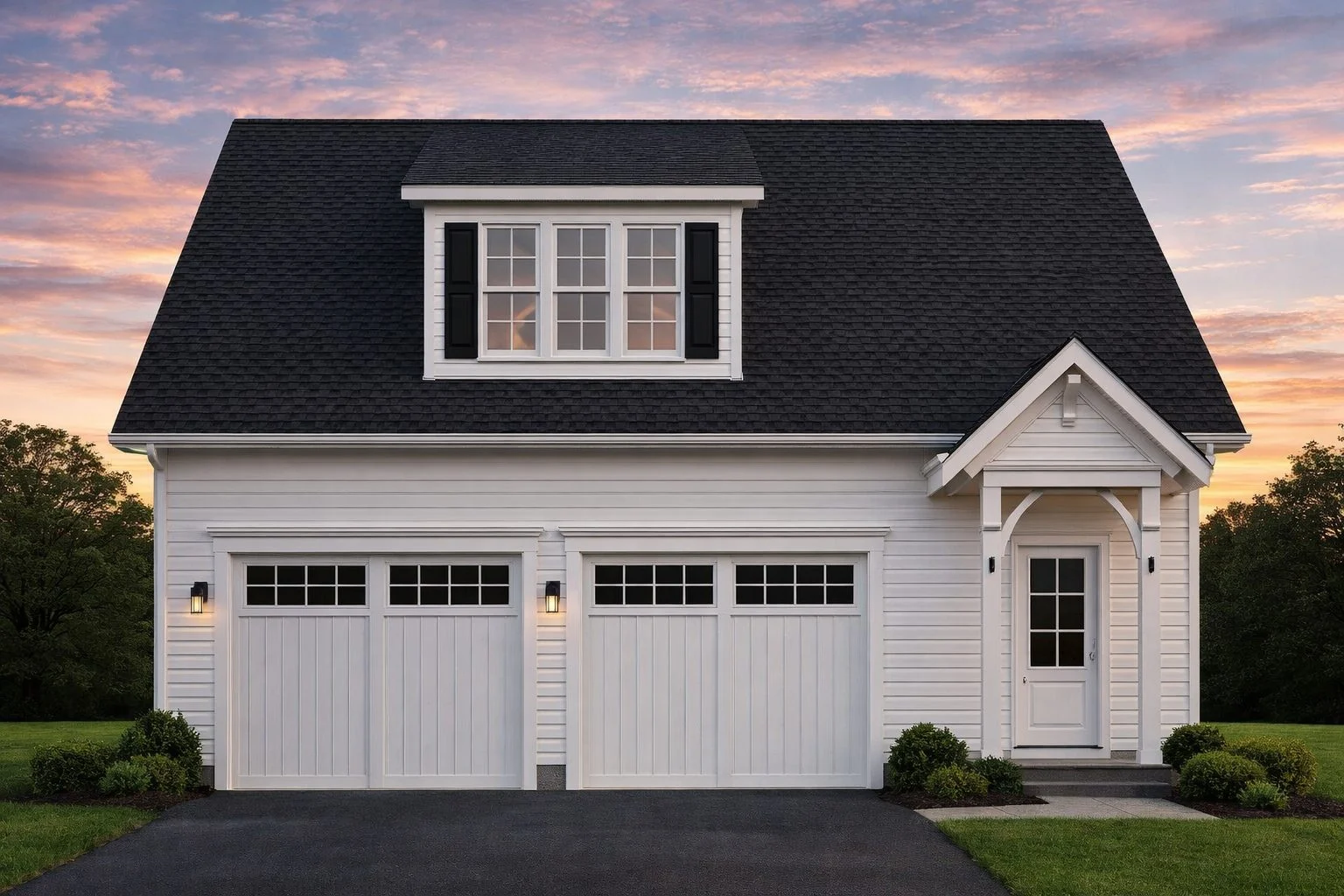 Front elevation of a Traditional Suburban style home with lap siding, stone veneer accents, double garage, and covered entry