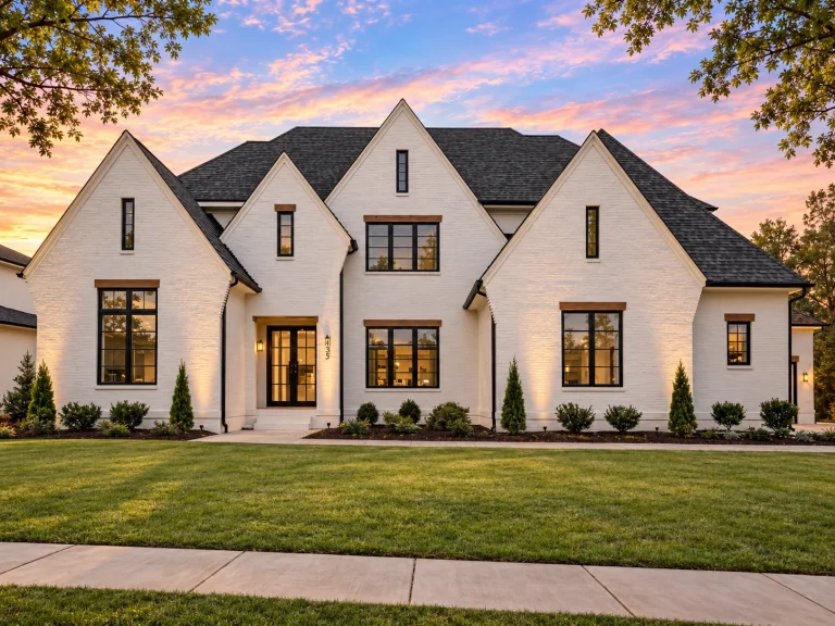 House Plans with Fireplace 18 Front elevation of a Modern Farmhouse home featuring white painted brick exterior, steep gabled rooflines, black window trim, and symmetrical façade