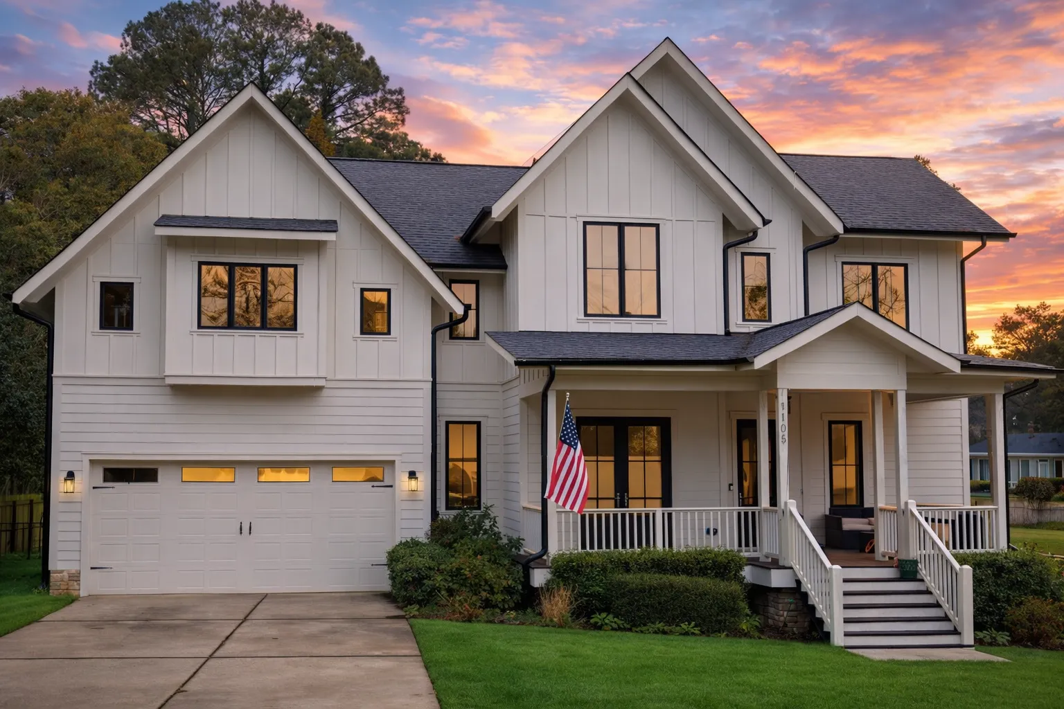 House Plans with Basement 14 Front elevation of a Modern Farmhouse style house featuring white board and batten siding, gabled rooflines, and a welcoming covered front porch