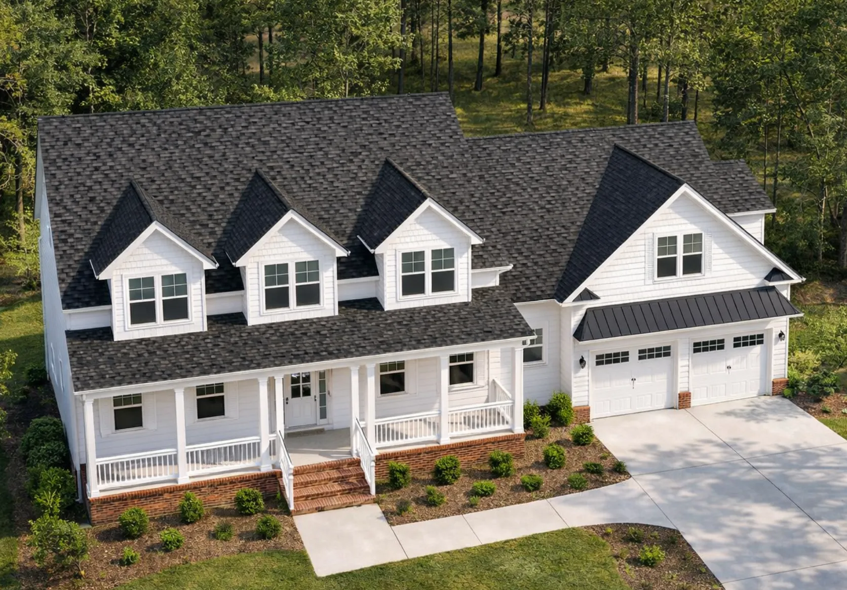 Front elevation of a Traditional Colonial Southern style house featuring horizontal siding, brick foundation accents, dormer windows, and a welcoming full-width porch