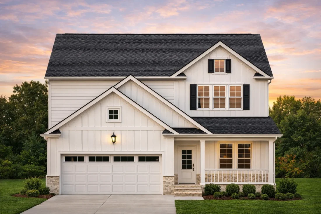 Front view of a Traditional Craftsman style home featuring gray lap and shingle siding, brick base columns, and a welcoming front porch with white trim details.