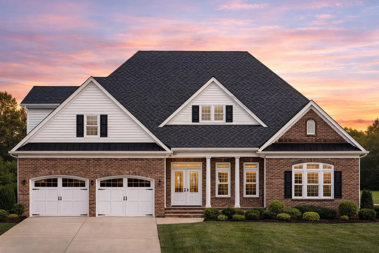 Front elevation of a New American modern traditional house featuring stone accents, horizontal siding, and a welcoming covered entry