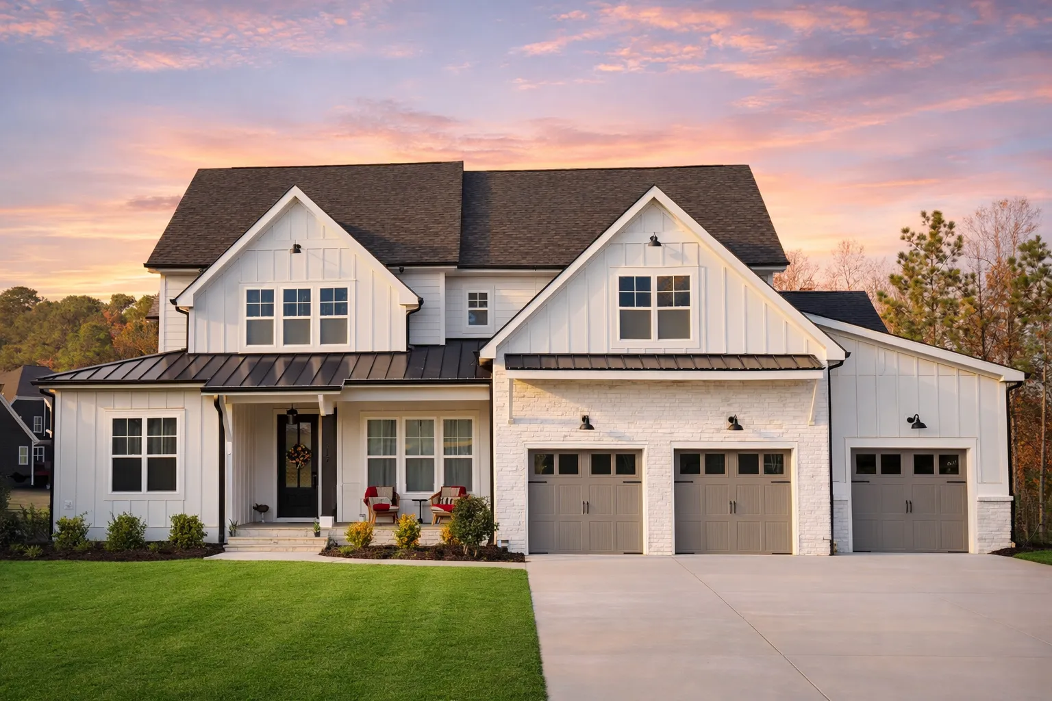 Front elevation of a modern farmhouse style home featuring board and batten siding, brick garage accents, steep gable rooflines, and a three-car garage