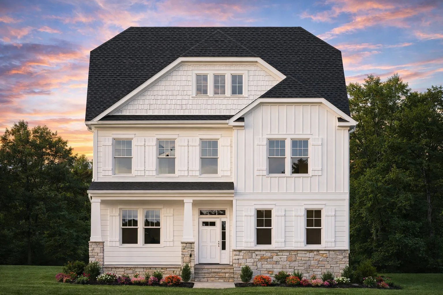 Front elevation of a New American Modern Traditional house with lap siding, stone accents, symmetrical windows, and a covered entry porch