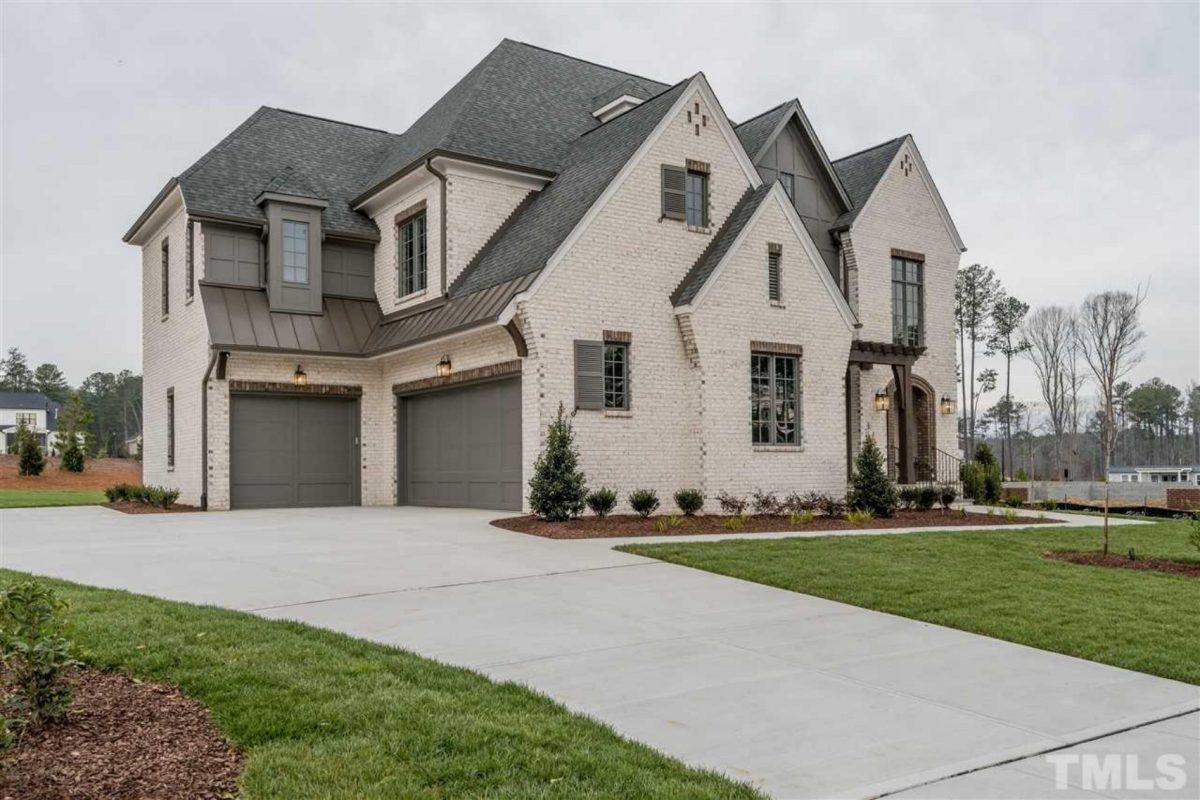 Elegant Tudor-Style house Plan with Detailed CAD Blueprints