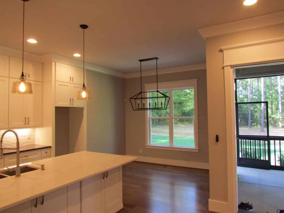 Craftsman house Floor Plan with Spacious Garage and Open Layout