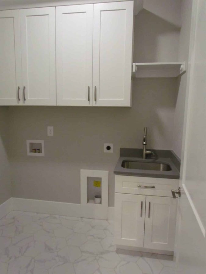 Craftsman house Floor Plan with Spacious Garage and Open Layout