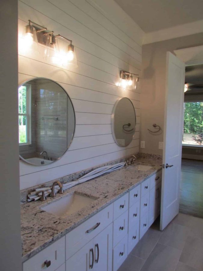 Craftsman house Floor Plan with Spacious Garage and Open Layout