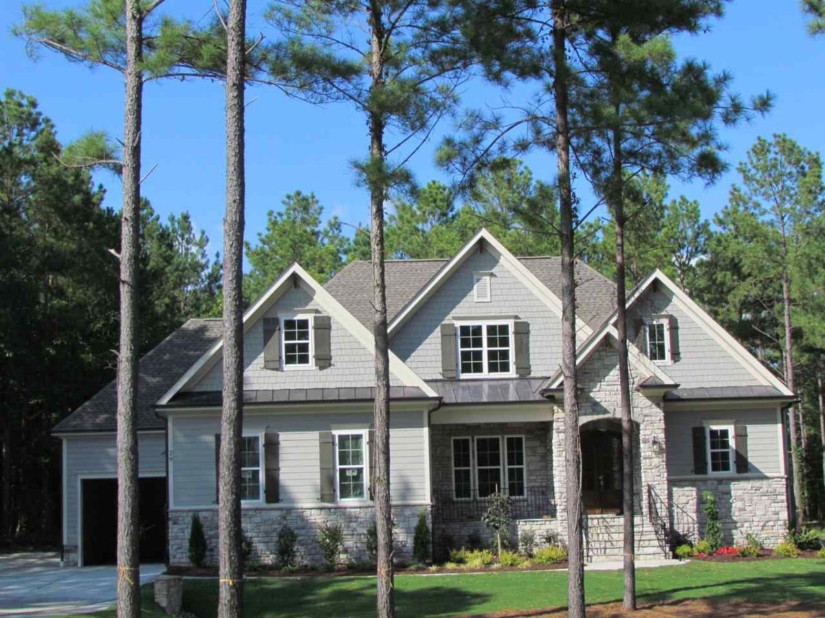 Craftsman house Floor Plan with Spacious Garage and Open Layout