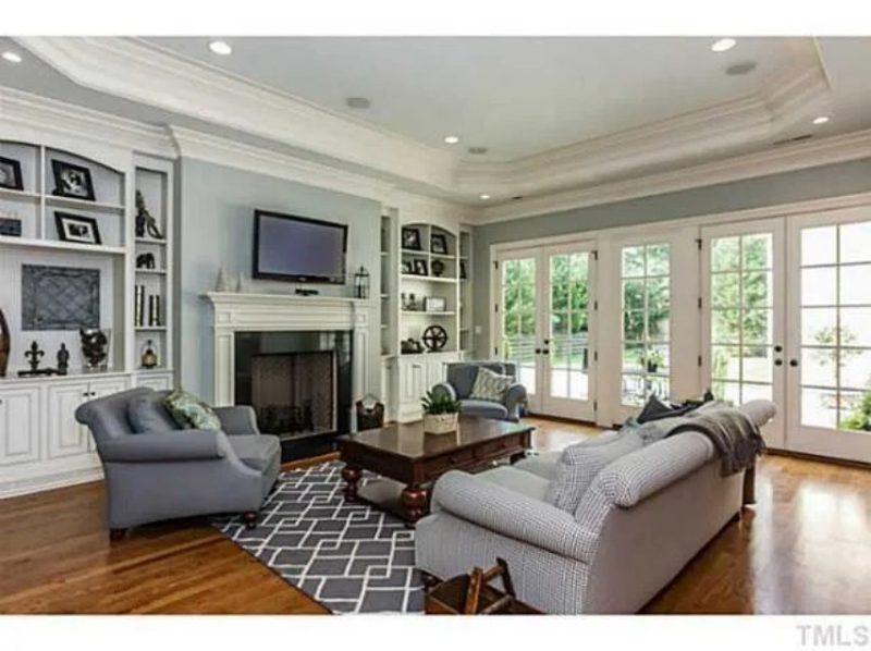 Traditional Craftsman house Plan with 4 Beds, 3 Garage Bays, and Vaulted Ceilings